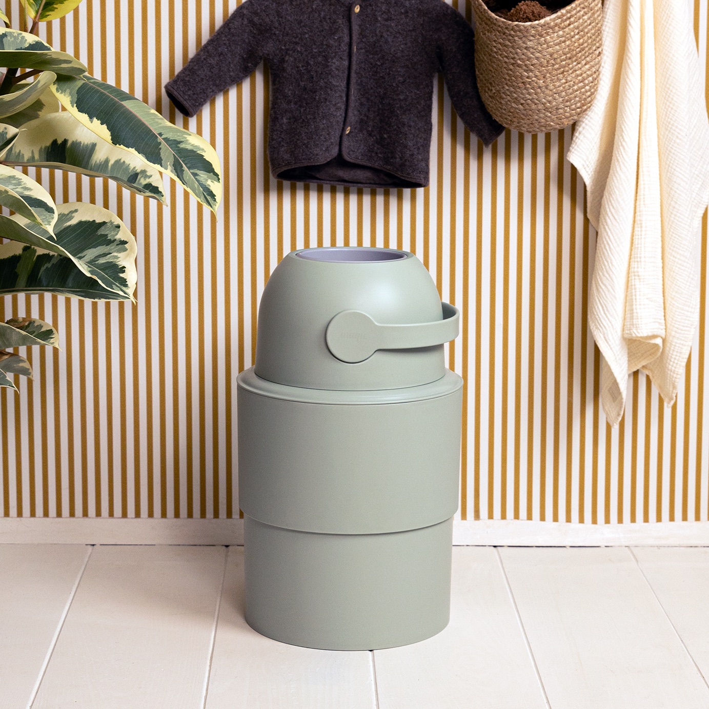 Magic Heka M nappy bin in Lichen in a styled baby room