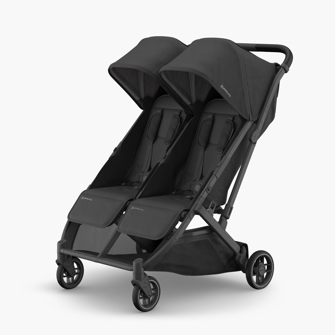 An UPPAbaby Minu Duo side-by-side double stroller in Jake charcoal, seen from the side
